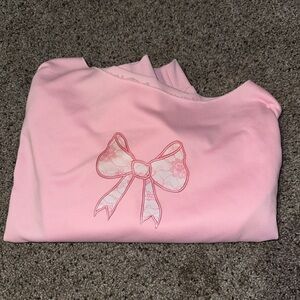 Pink Top with Bow Design